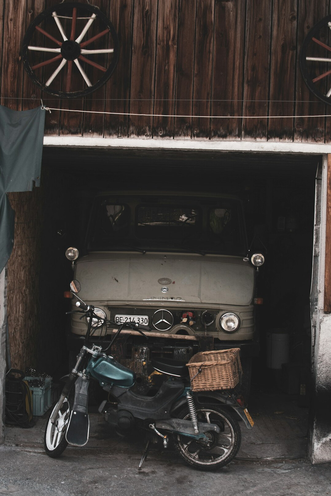 Historic stone garage housing vintage automobiles in Colonia del Sacramento