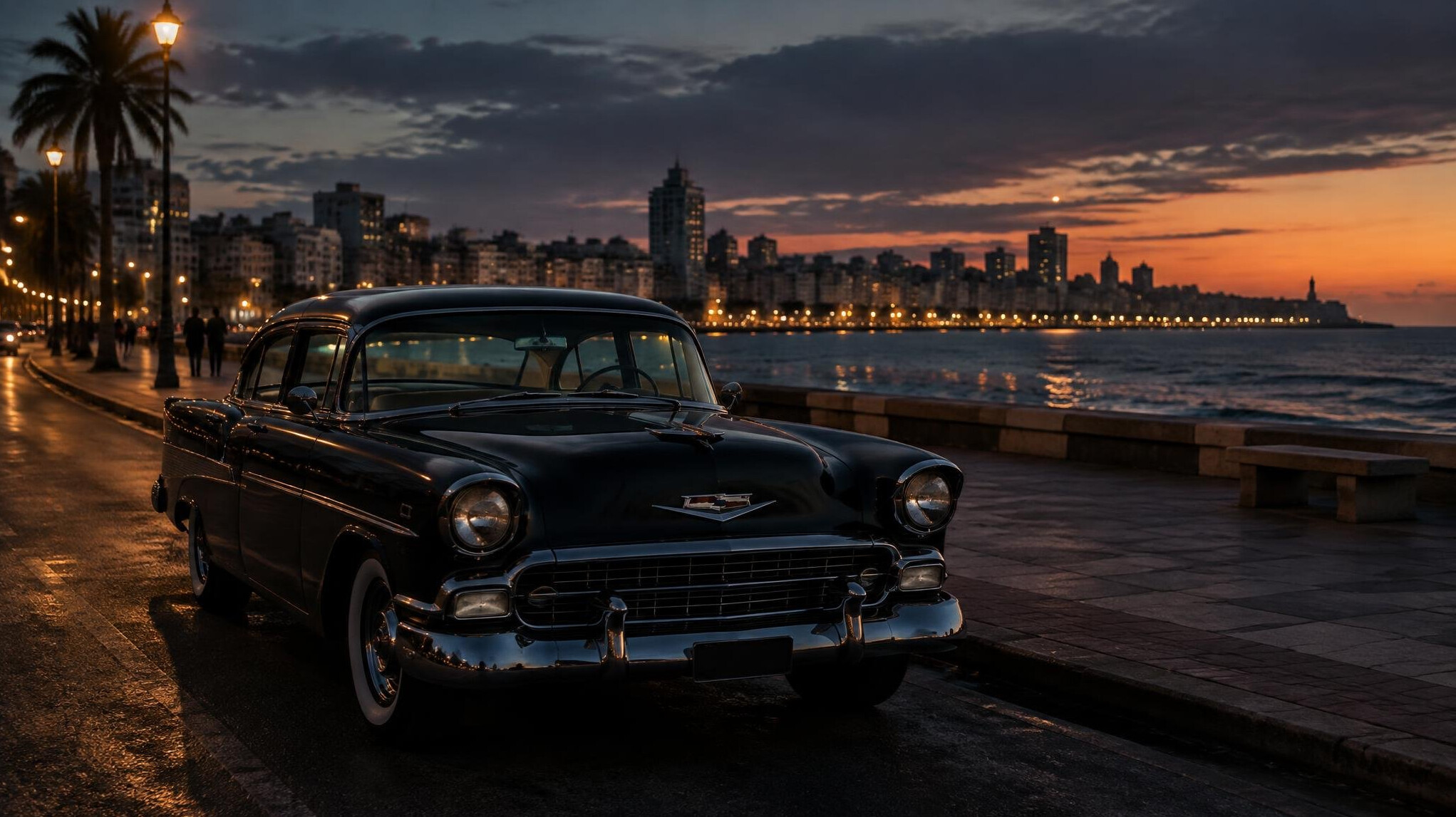 Classic automobile parked along the Rambla in Montevideo at dusk